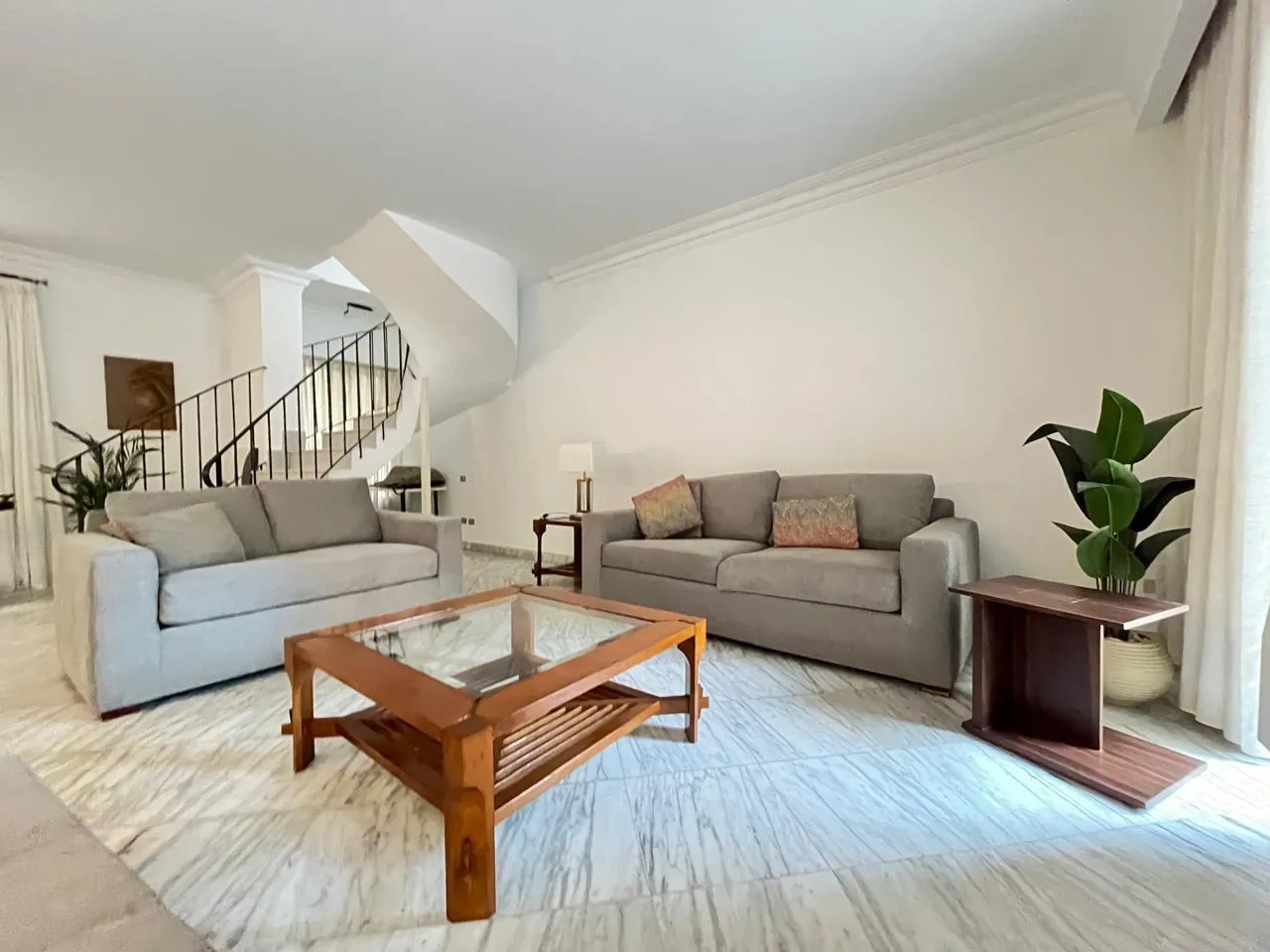 Fully finished, furnished living room with a marble floor and an internal staircase in a ground floor in Sarayat, Maadi