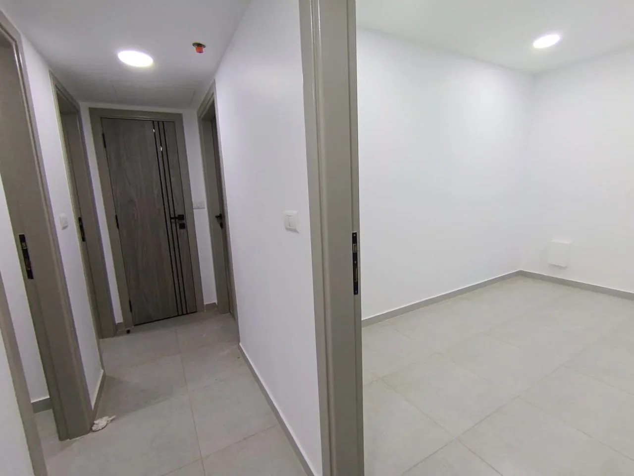 Clinic corridor with doors to separate examination rooms in a 160 m² clinic for rent in Maadi Corniche