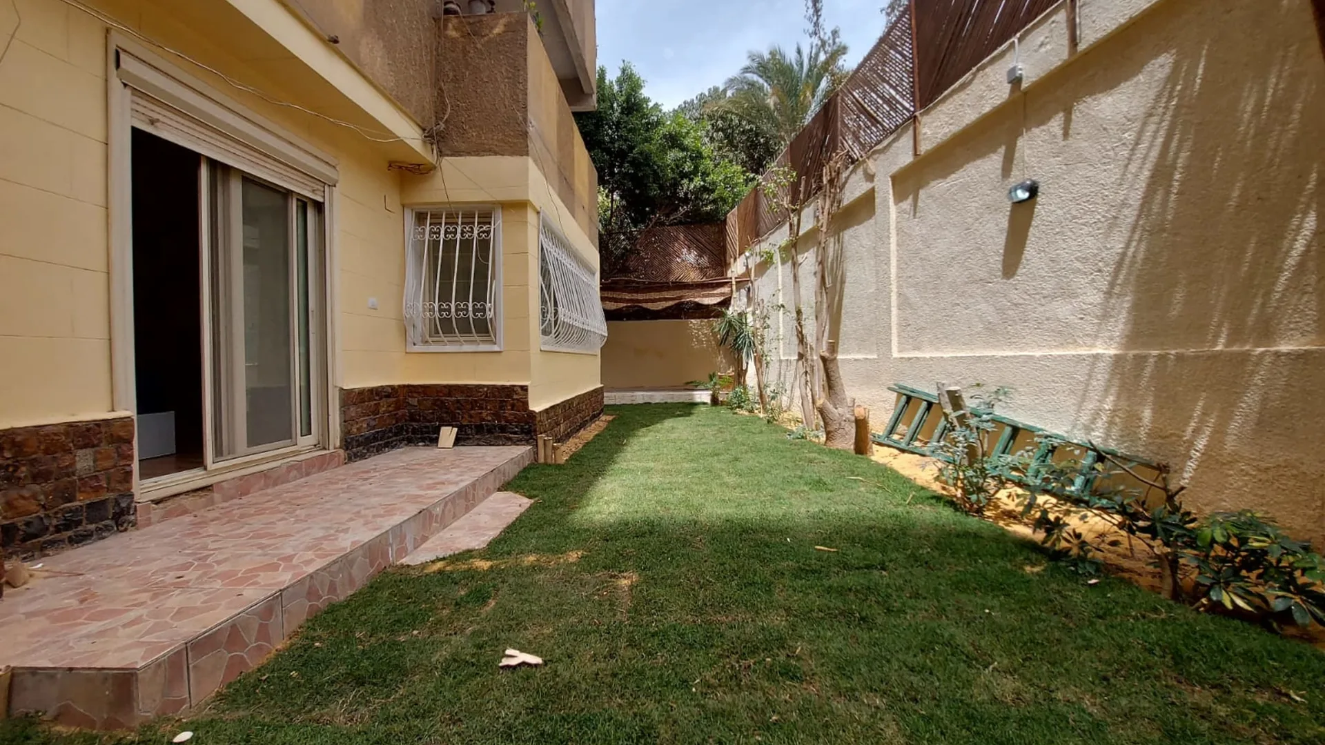 Private garden lawn beside a ground floor apartment in Degla, Maadi