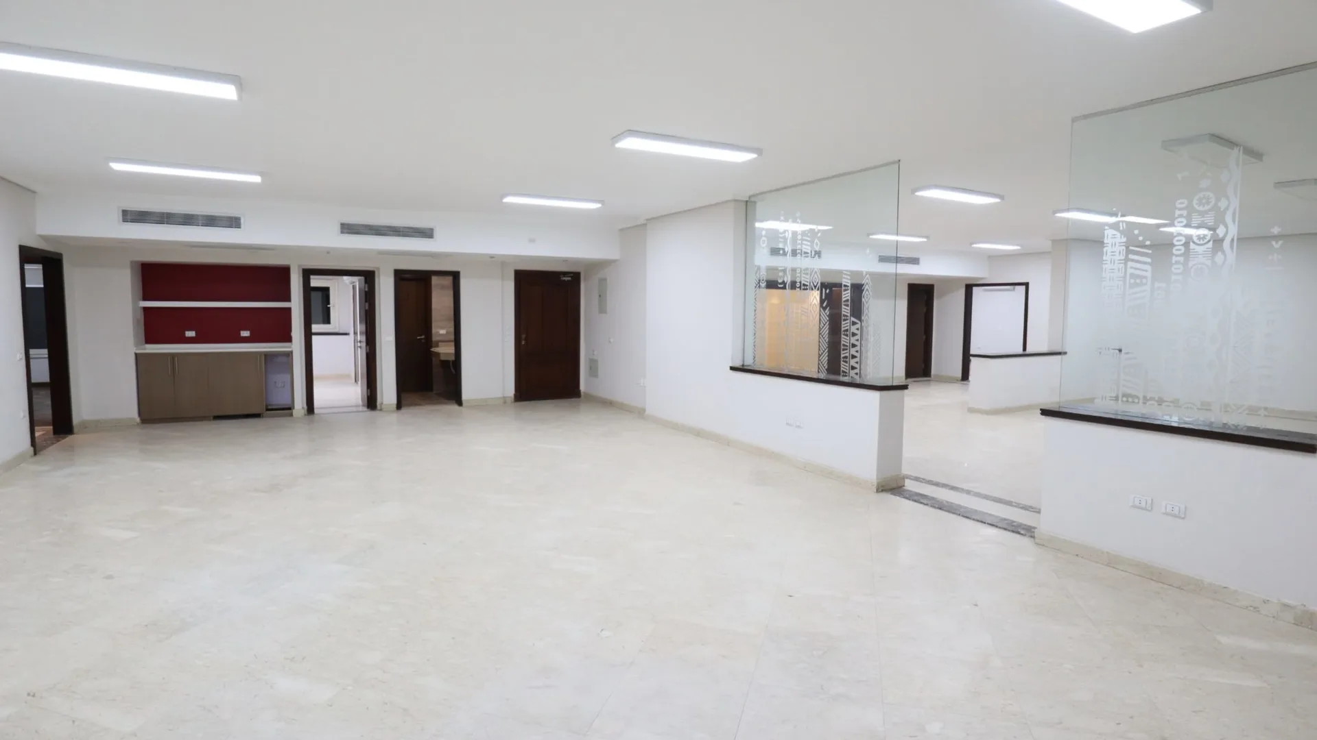 Bright empty office with a glass partition in Degla, Maadi