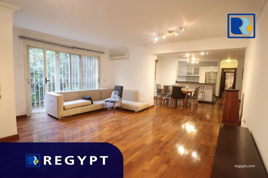 Reception with wooden floors in a Ground Floor With Pool