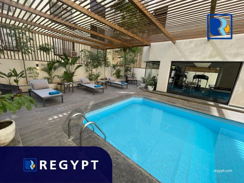shared pool in a Ultra Modern Ground Floor in sarayat el maadi