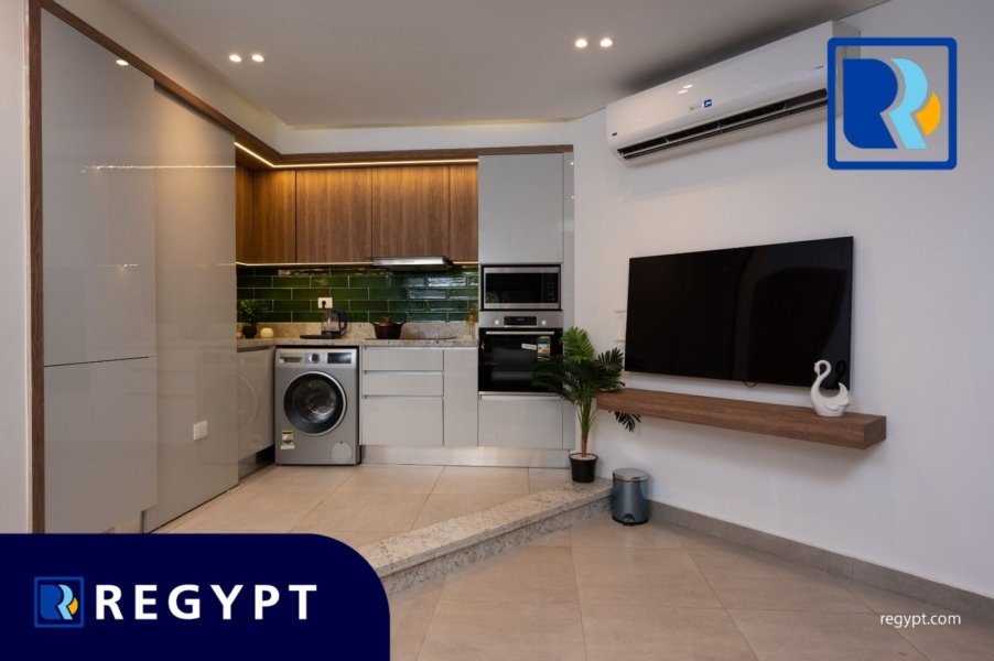 Kitchen full of appliances in a Ultra Modern Ground Floor