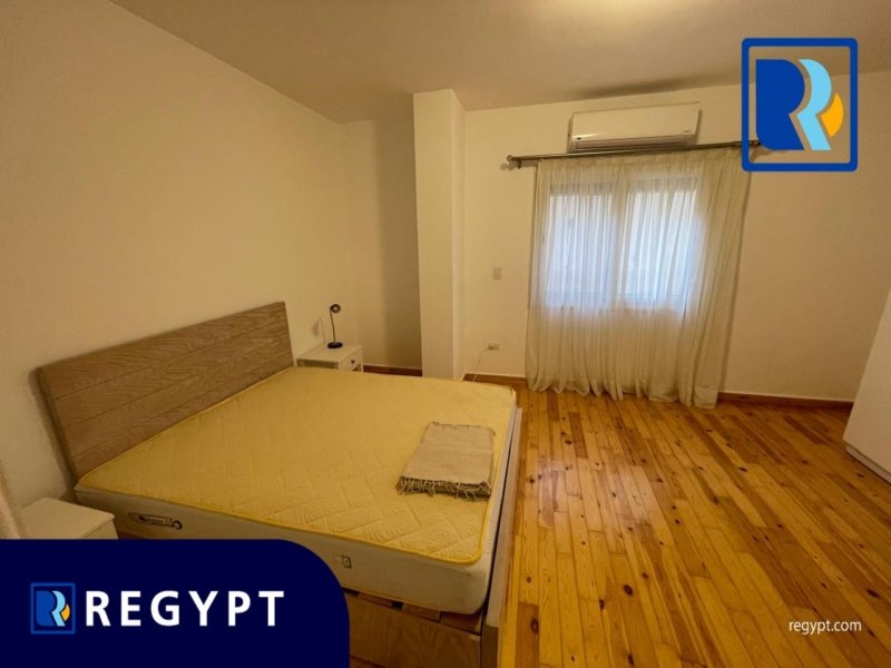 Bedroom with wooden floors in a ground floor in sarayat el maadi
