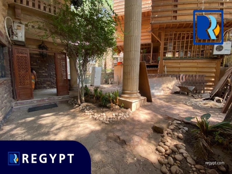 Outside space with sunlight in a ground floor for rent in maadi degla