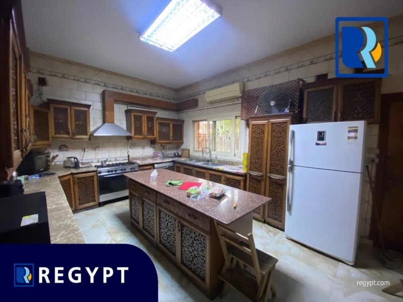 Kitchen full of appliance in a ground floor for rent in maadi degla