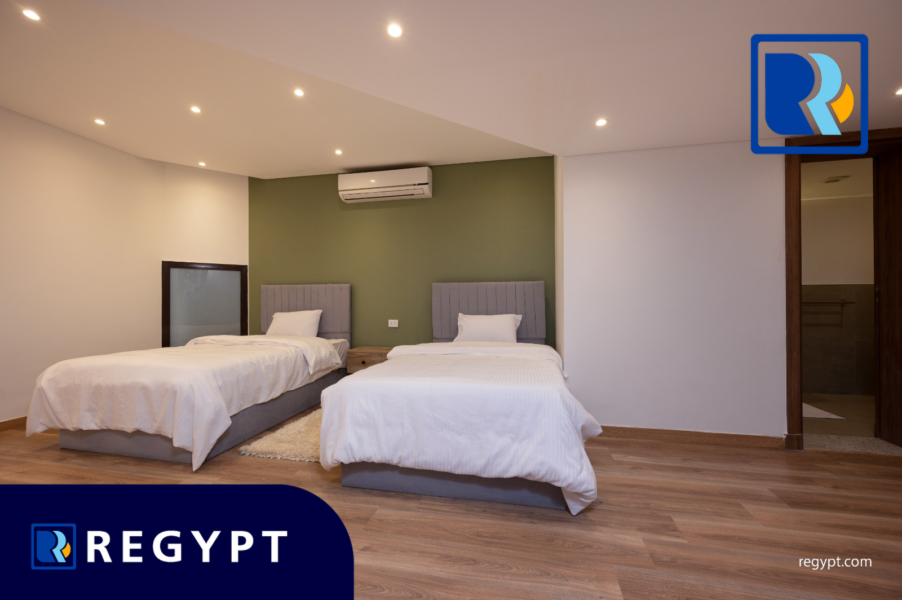 Bedroom with two small beds in a Ultra Modern Ground Floor for rent in sarayat