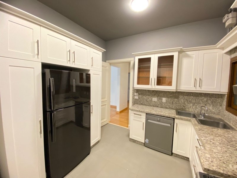 Kitchen full of appliances in a ground floor for rent