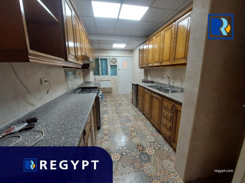 Kitchen full of appliances in a groundfloor for rent in maadi sarayat
