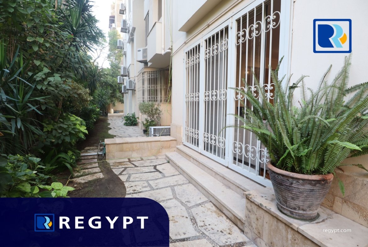Back yard in a Ground Floor With Pool for rent in maadi sarayat