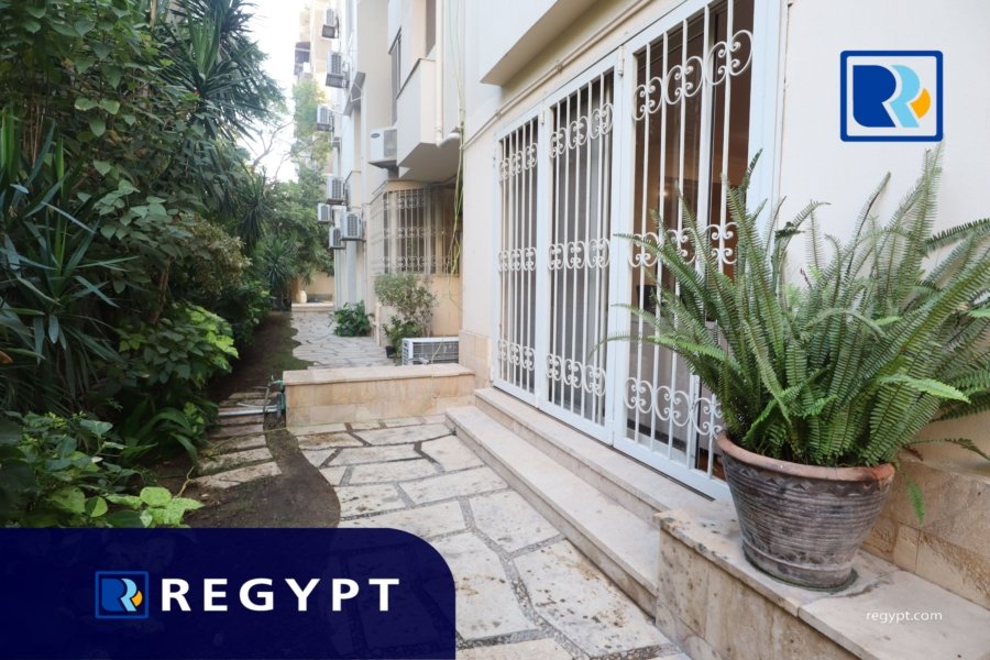 Back yard in a Ground Floor With Pool for rent in maadi sarayat