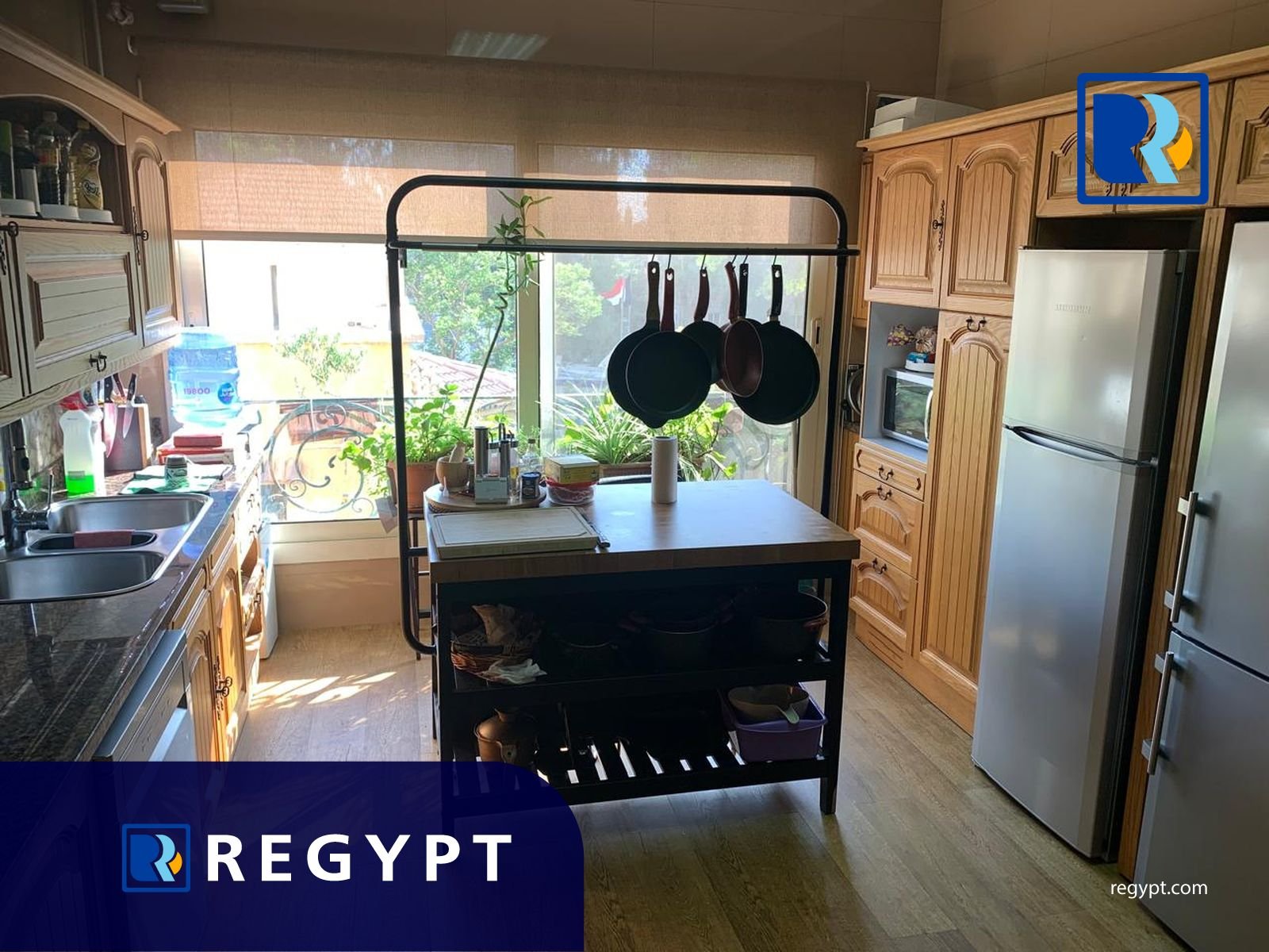 Kitchen full of appliances in a Ideal Apartment For Rent