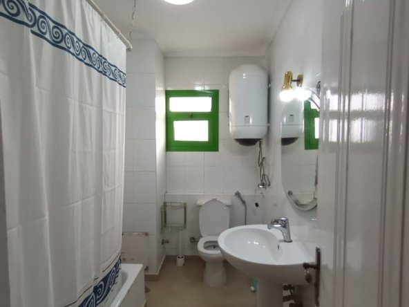 Bathroom with bathtub in a Fully equipped Apartment For Rent