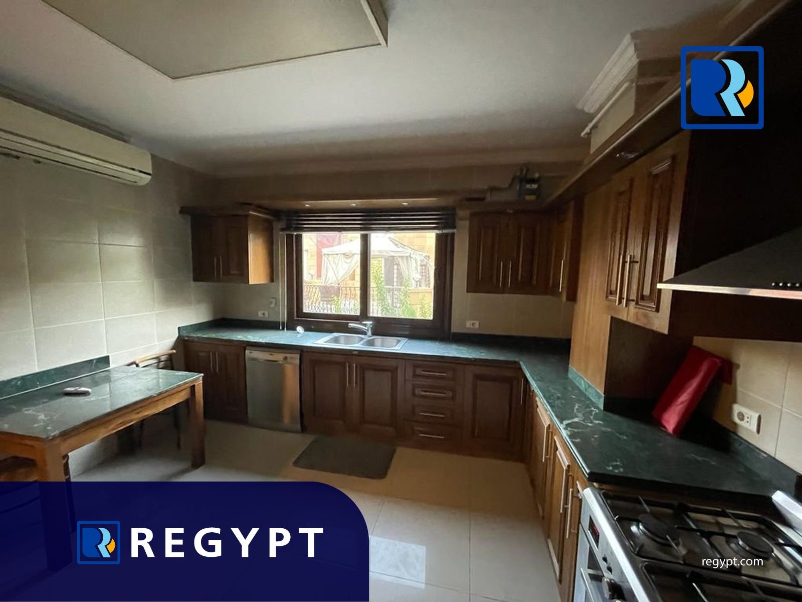 Kitchen full of appliances in a Apartment For Rent In Sarayat