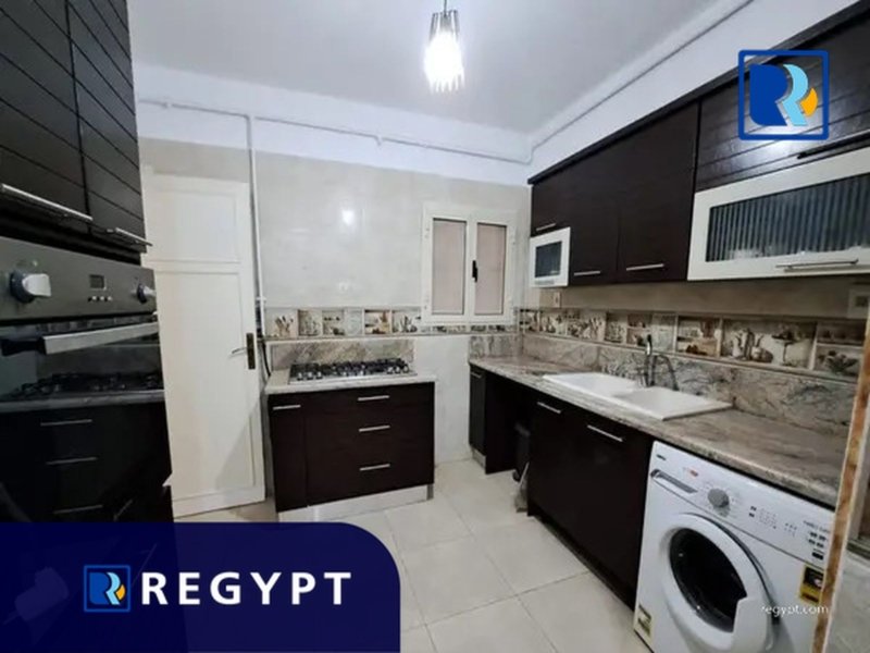 Kitchen full of appliances in a Affordable Rental Apartment