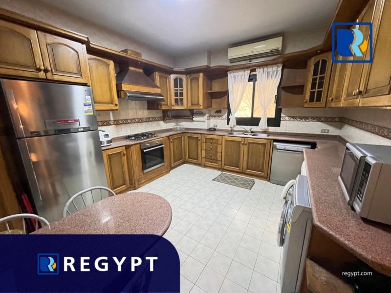Kitchen full of appliances in a Ground Floor With Private Pool
