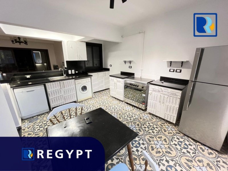 Kitchen full of appliances in a Exclusive Apartment for rent