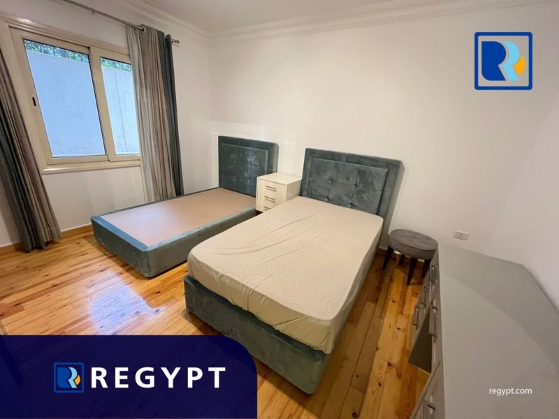 Bedroom with two small beds